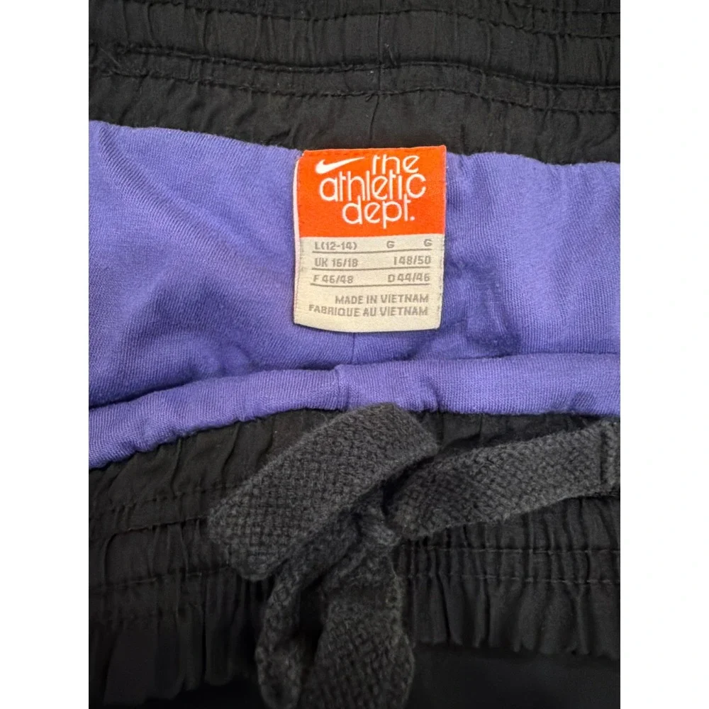 Vintage Nike The Athletic Dept Black Track Pants Purple Piping Swoosh Mens Large